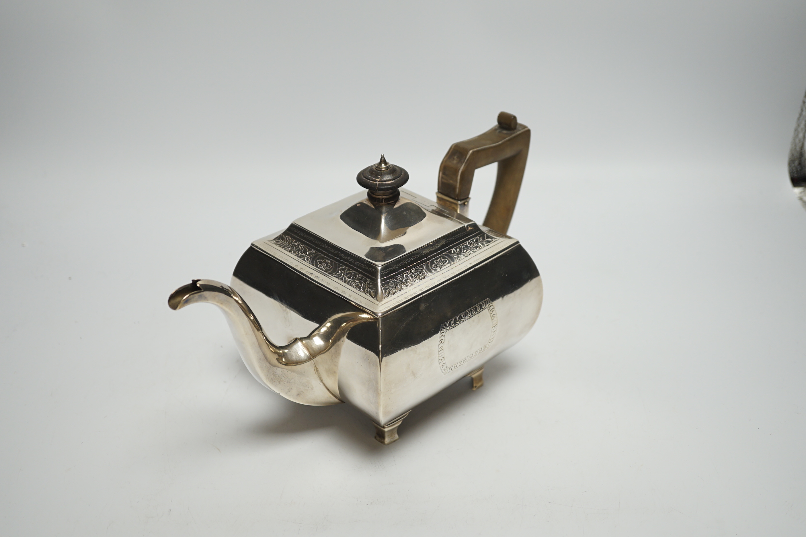 A George III silver shaped square teapot, by Urquhart & Hart, London, 1805, on bracket feet, gross weight 19.4oz.